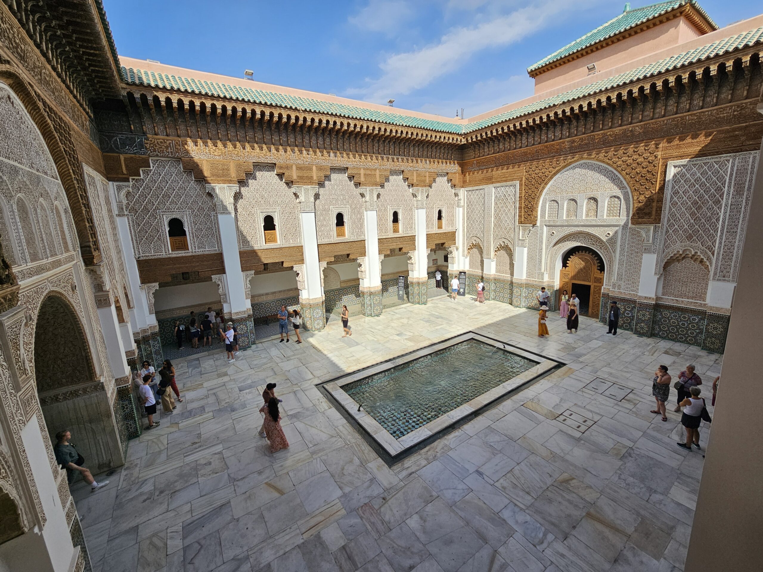 Photo taken from the top floor of the inside water pool and courtyard in the Madrasa Ben Youssef in Marrakech