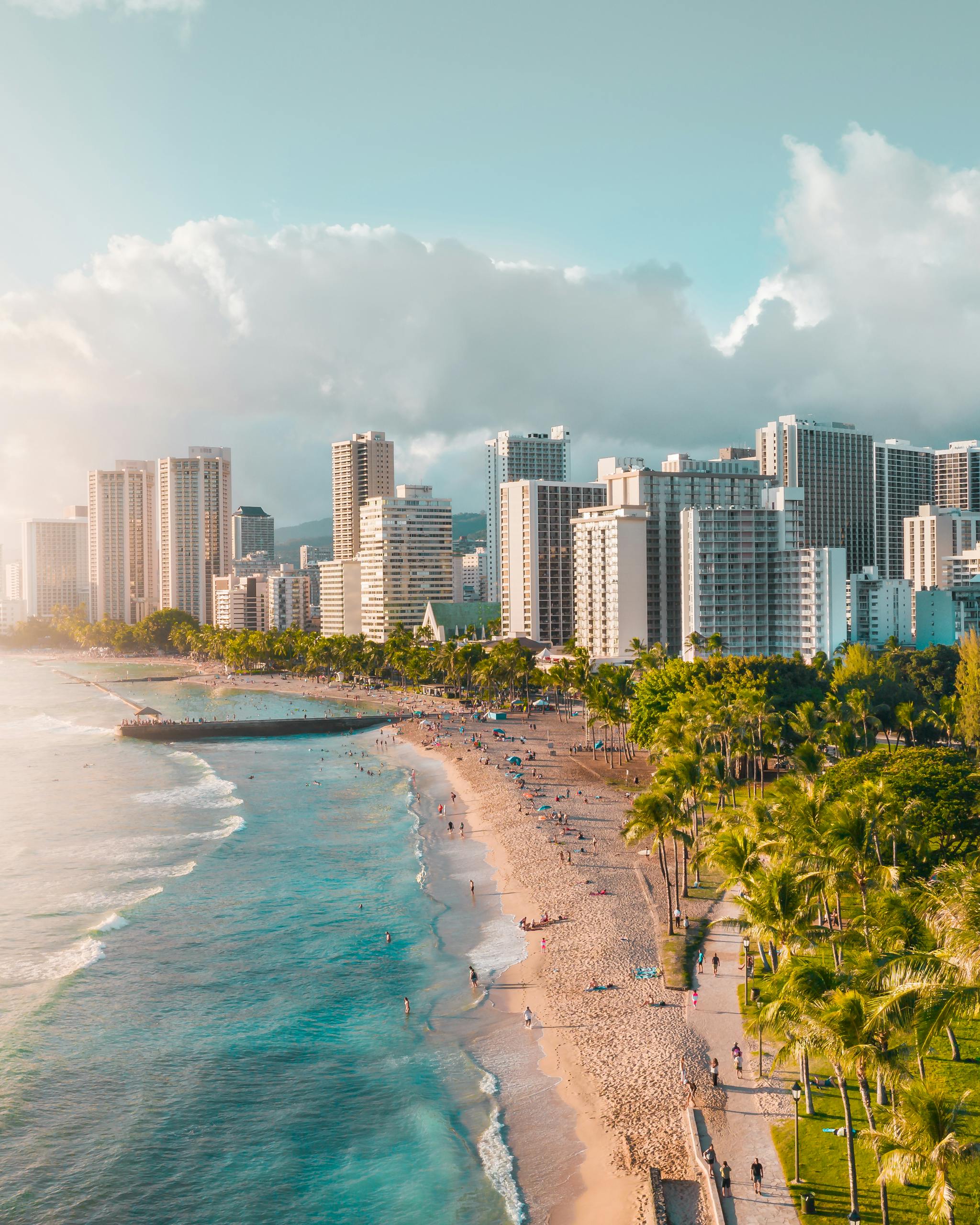 Discover the breathtaking beauty of Waikiki Beach, capturing the tropical essence of Hawaii's iconic coastline.
