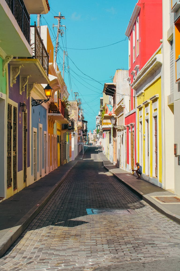 Vibrant streetscape of Old San Juan, Puerto Rico, showcasing colorful colonial architecture.